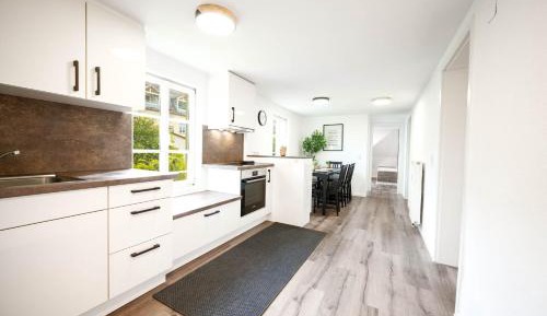 Four-Bedroom Apartment with Balcony 