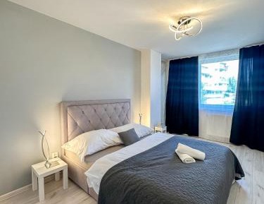 Three-Bedroom Premium Apartment with Balcony