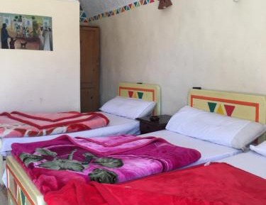 Quadruple Room with Private Bathroom