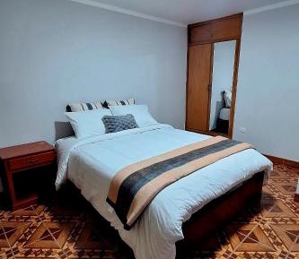 Queen Room with Shared Bathroom