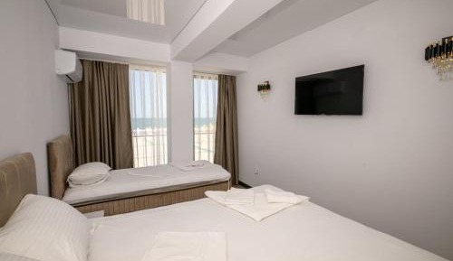 Deluxe Triple Room with Sea View