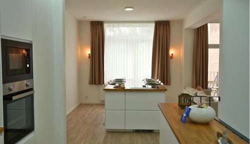 Three-Bedroom Premium Apartment with Balcony