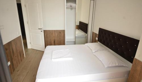 One-Bedroom Apartment with Balcony and Sea View