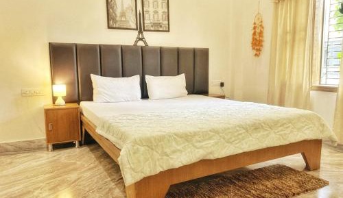 One-Bedroom Apartment with Balcony and City View