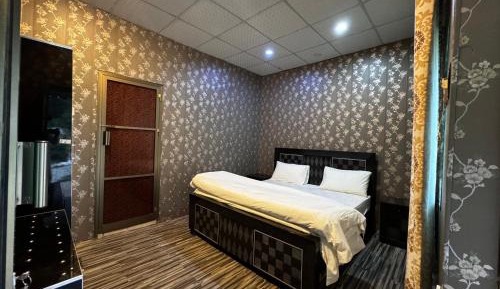 Deluxe Room (2 Adults + 1 Child)