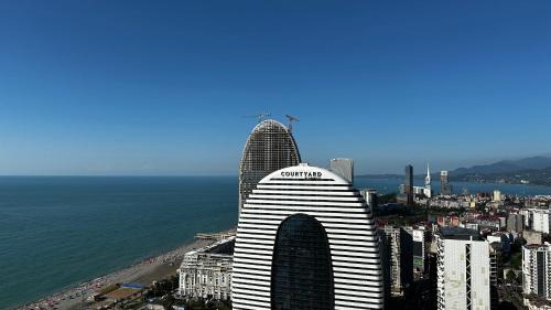 One-Bedroom Apartment with Balcony and Sea View