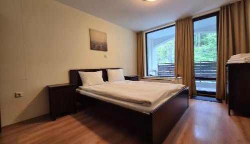 Two-Bedroom Apartment with Balcony