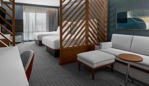 Queen Suite with Two Queen Beds and Sofa Bed