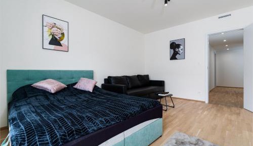 Four-Bedroom Apartment with Balcony 