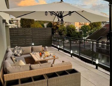 One-Bedroom Apartment with Balcony and City View