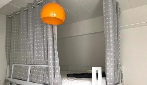 Single Bed in Dormitory Room