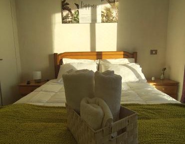 One-Bedroom Apartment with Balcony and City View