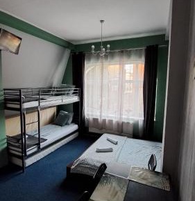 Quadruple Room with Private Bathroom