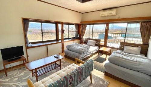 Quadruple Room with Shared Bathroom