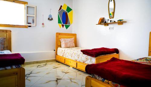Single Bed in Dormitory Room