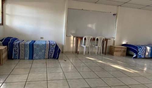 Single Bed in Dormitory Room
