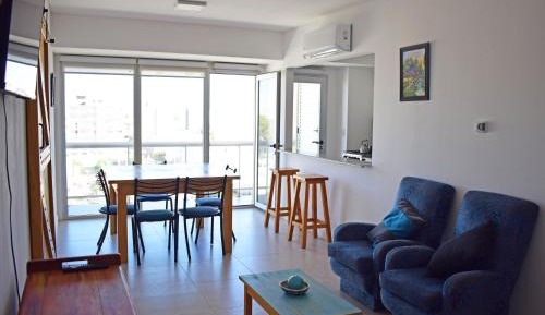 One-Bedroom Apartment with Balcony and City View