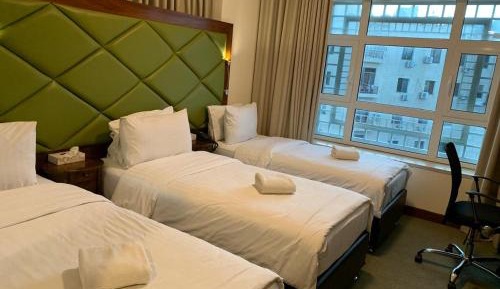 Deluxe Triple Room