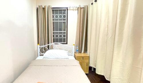Single Bed in Dormitory Room