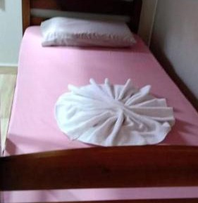 Single Bed in Dormitory Room