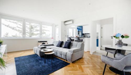 One-Bedroom Apartment with Balcony and City View