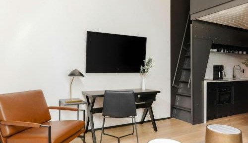 Superior Lofted Queen Room with Sofa Bed