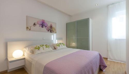 Two-Bedroom Apartment with Terrace and Pool View