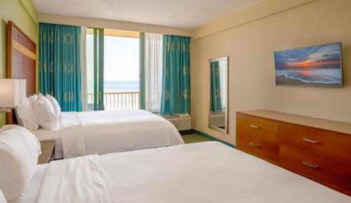 Standard Queen Room with Two Queen Beds and Pool View
