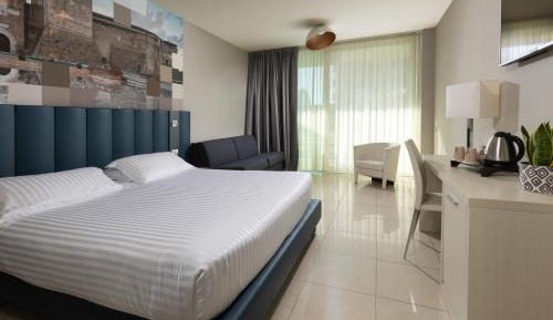 Superior Double Room with Sofa Bed and Balcony with Side Sea View