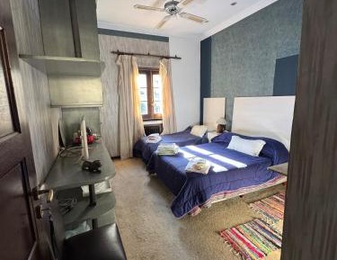 Triple Room with Shared Bathroom