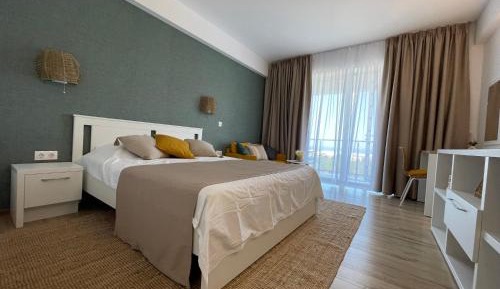 One-Bedroom Apartment with Balcony and Sea View