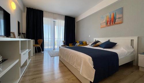 One-Bedroom Apartment with Balcony and Sea View