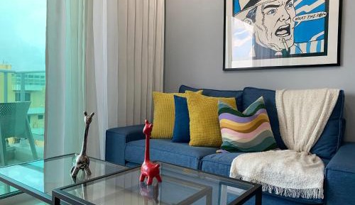 One-Bedroom Apartment with Balcony and City View