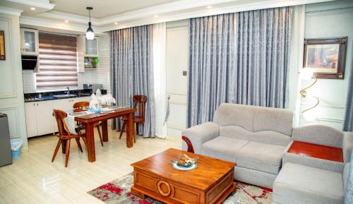One-Bedroom Apartment with Balcony and City View