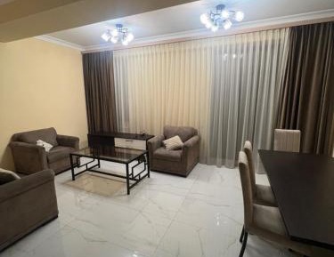 Three-Bedroom Premium Apartment with Balcony