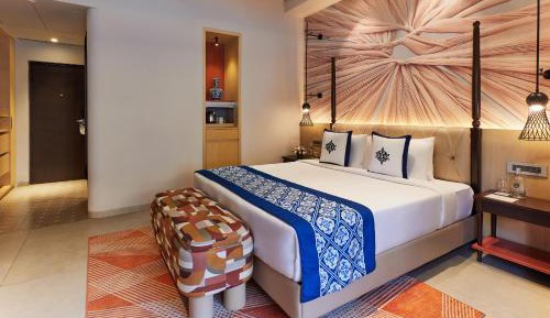 Premium Room King Bed Pool View with Balcony -  2 Pints of beer per day , Shuttle to nearest beach, 2 piece laundry per day