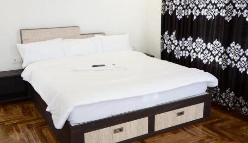 Deluxe Room (2 Adults + 1 Child)