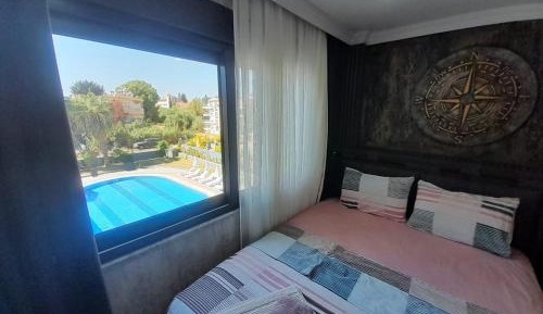 One-Bedroom Apartment with Pool View