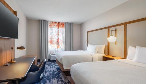 Extended Queen Suite with Two Queen Beds and Sofa Bed