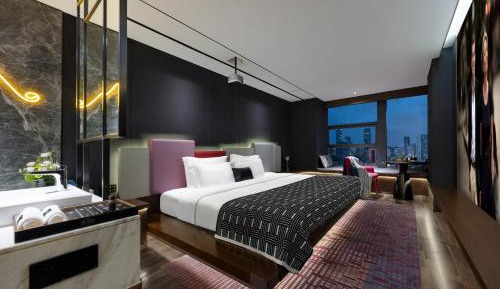 Deluxe Room (2 Adults + 1 Child)