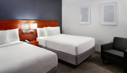 Suite with Two Double Beds and Sofa Bed