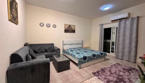 One-Bedroom Apartment with Balcony and City View