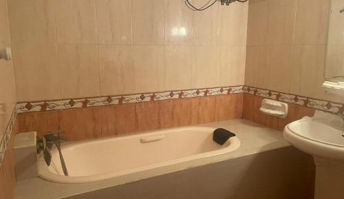 Queen Room with Shared Bathroom