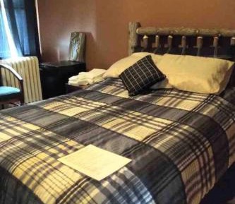 Queen Room with Shared Bathroom