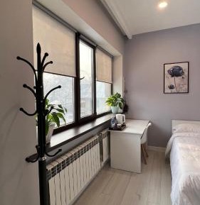 Queen Room with Shared Bathroom