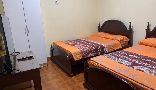 Deluxe Room (2 Adults + 1 Child)
