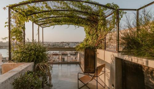 One-Bedroom Apartment with Balcony and City View