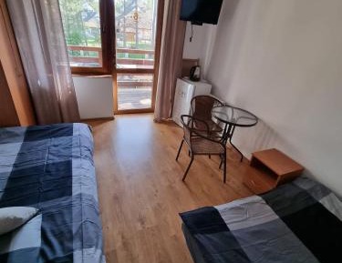 Quadruple Room with Private Bathroom