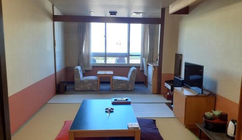 Quadruple Room with Shared Bathroom