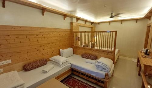 Deluxe Quad Room With Balcony